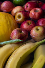 bananas, apples and melon dipped in water