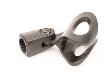 Black plastic microphone holder isolated above white background