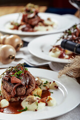 Gourmet appetizer: Beautifully decorated catering banquet foie gras with berries © Georgii