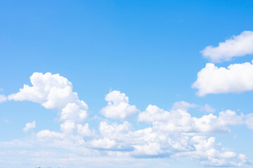 Many of cumulus clouds far on horizon as natural background