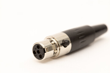 Plastic input Speakon for large speakers isolated above white background