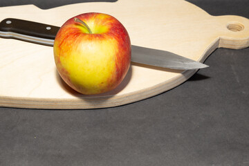 Apple on a cutting board