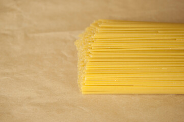 italian spaghetti on wooden background.