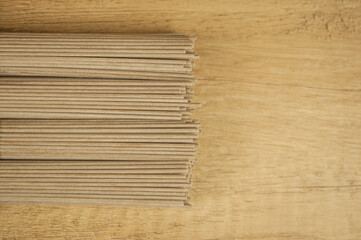 soba - buckwheat noodles (raw buckwheat noodles). soba noodles. food background