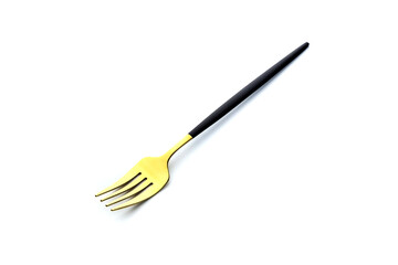 Gold fork on a white background. Flatware for food.