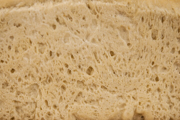 freshly baked rye bread with bran and cereal seeds: texture close-up. Healthy food.