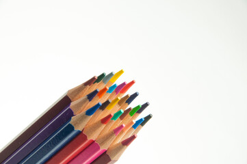 colored pencils on a white background. education concept. illustration of training.