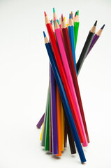 Fototapeta premium colored pencils on a white background. education concept. illustration of training.