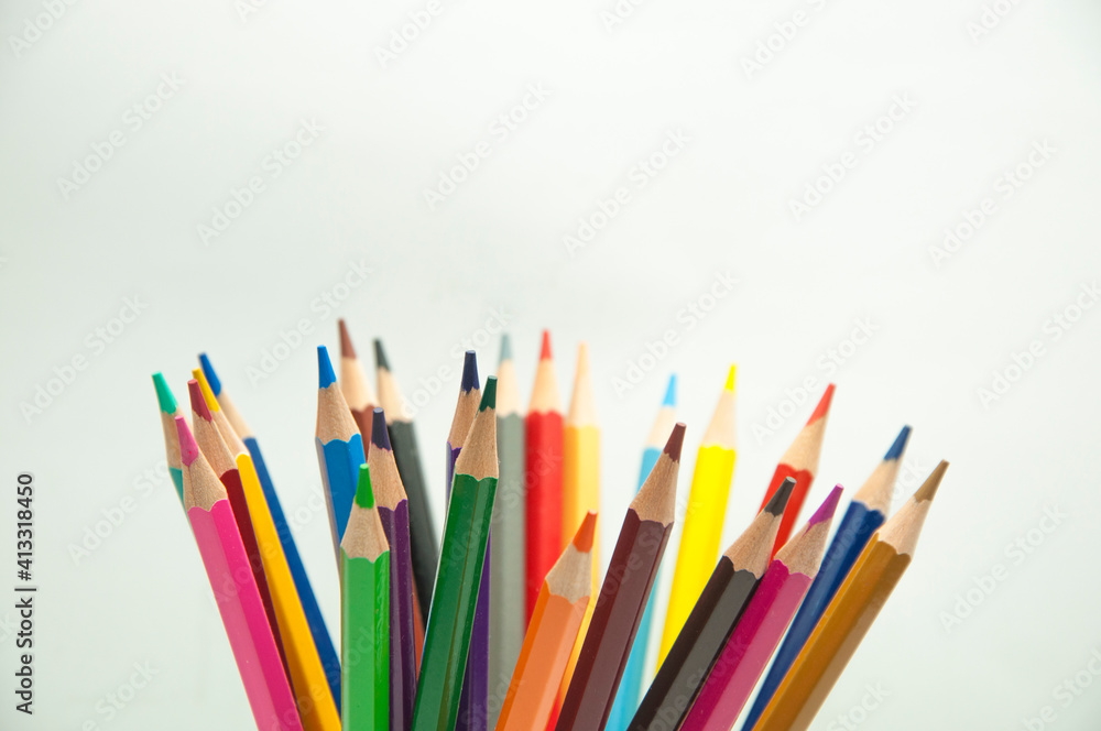 Wall mural colored pencils on a white background. education concept. illustration of training.