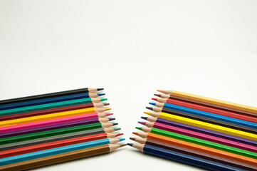 colored pencils on a white background. education concept. illustration of training.
