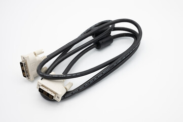 old black DVI type cable with white connector. White background