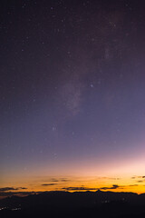 Obraz na płótnie Canvas Starry colorful sky with early morning light.