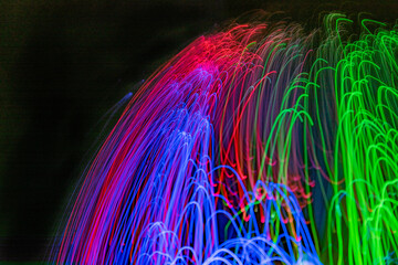 Colorful psychedelic lights and shadows in a dazzling stream of diverse light