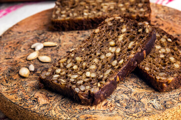 Sliced rye bread baked with sunflower seeds.