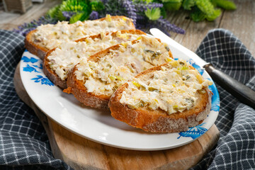 Sandwiches with a paste of mackerel, egg and cucumber.