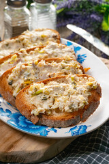 Sandwiches with a paste of mackerel, egg and cucumber.
