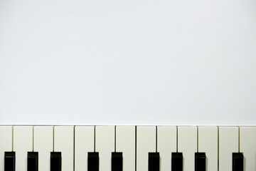 piano keyboard close up on white
