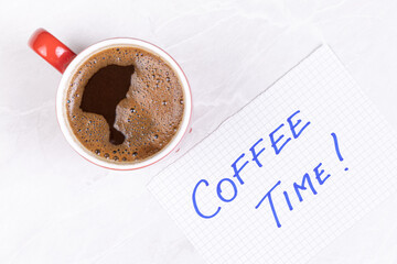 Top view of cup of coffee with Coffee Time sign
