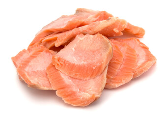 smoked salmon segments isolated on white background cutout. Prepared fish fillet fibres.