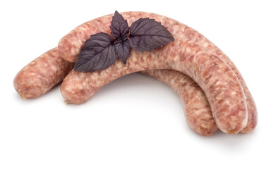 Raw sausage with basil leaf isolated on white background