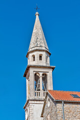 Fototapeta na wymiar Bell tower. Church in Budva, Montenegro