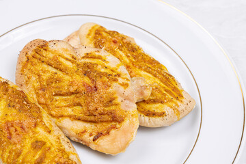 Fried Chicken Breasts with mustard and cheese