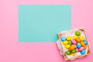 Easter bunny. Happy Easter holiday background concept.Flat lay colorful bunny egg with accessory to...