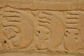 Beautiful carvings at the ancient ruins of Chan Chan, Trujillo, Peru