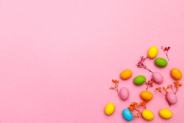 Easter bunny. Happy Easter holiday background concept.Flat lay colorful bunny egg with accessory to celebration on modern rustic pink pastel paper at home office desk.