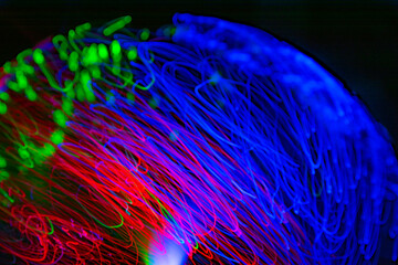Colorful psychedelic lights and shadows in a dazzling stream of diverse light