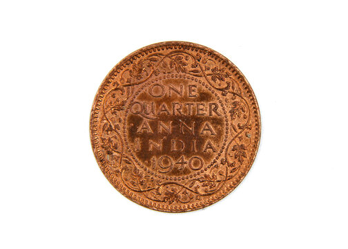 Vintage copper indian coin quarter anna on white background isolated