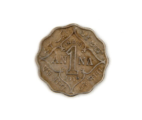 Old coin of India one anna on white background isolated