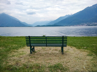 Naklejka na ściany i meble Bench on the lakeside of Lake Como