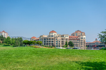 Landscape with luxury residential buildings and boat pier at front