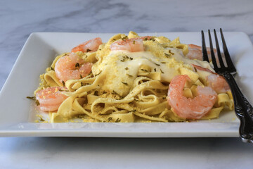 fettuccinetop with shrimpand parmesan cheese