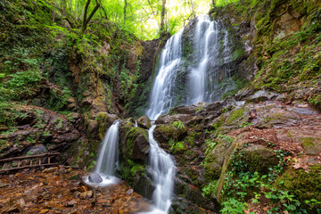 Obraz premium Waterfall in the forest of Kolesino village, North Macedonia