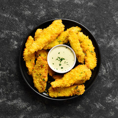 Crispy fried breaded chicken breast strips