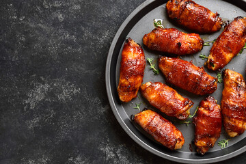 Bacon wrapped grilled chicken wings