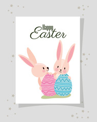 invitation with happy easter lettering and two pink rabbits with easter eggs