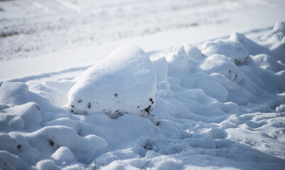closeup of snow pile on a parking after the snow plow removing