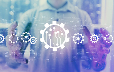 Automation concept with young man holding his hands