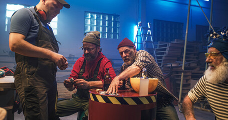 Male friends making bets while watching match