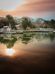 Fototapeta premium Dramatic sunrise seascape in the cloudy morning at the marina