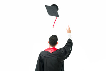 Thrilled male graduate celebrating in his graduation ceremony