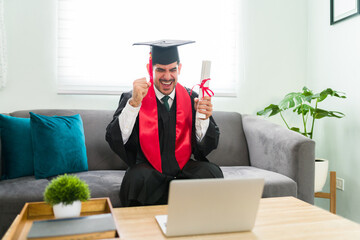 Young graduate attending his online virtual ceremony