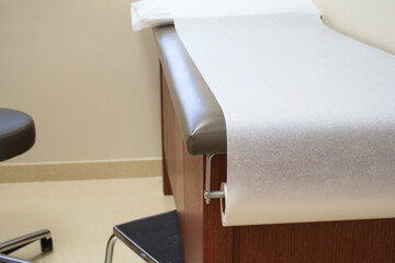 Patient examination table in a doctors office