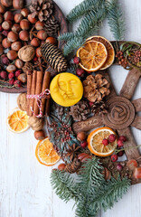 Winter altar for Yule sabbath. pagan holiday. Sun and moon symbol, wheel of the year, cinnamon,...