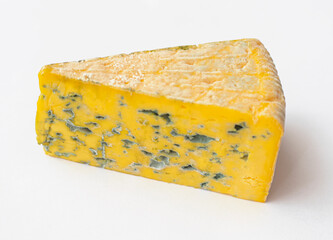Piece of moldy cheese on a white background