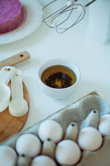 Young beautiful woman bakes a cake. Sweets. Confectionery.