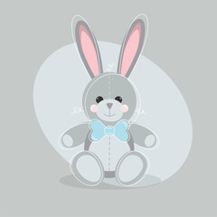 cute toy eared hare with a blue bow as a gift for easter or valentine's day